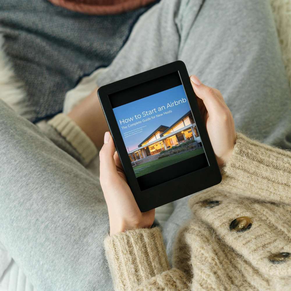 Airbnb Hosting A woman holding a tablet featuring "How to Start an Airbnb, The Complete Guide for New Hosts" templates. Airbnb Hosting A woman holding a tablet featuring "How to Start an Airbnb, The Complete Guide for New Hosts" templates.
